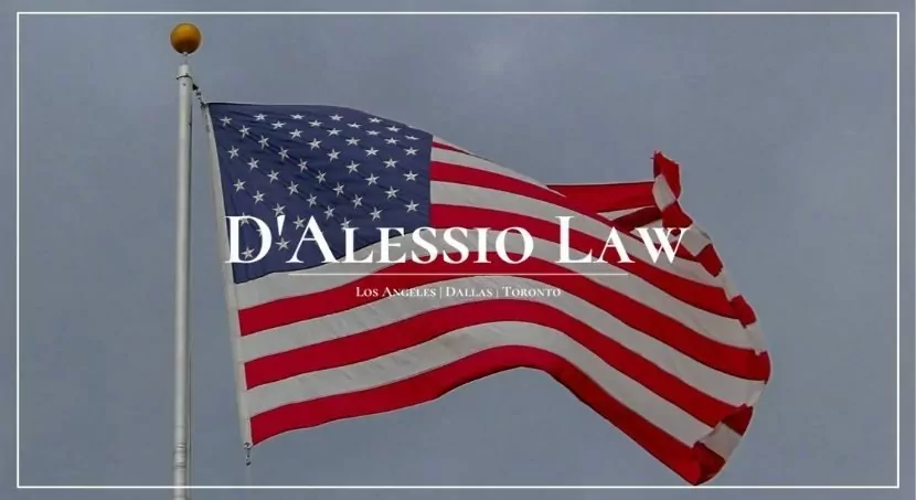 American flag with D'Alessio Law, Los Angeles Dallas Toronto text