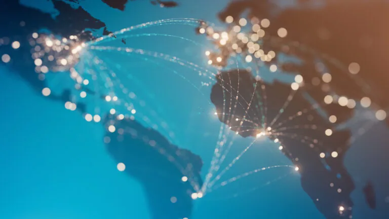 Glowing connection lines between international airports.